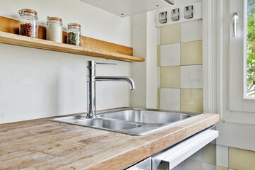 Close up of elegant sink in luxury kitchen