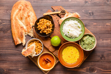 Traditional Indian food on wooden background