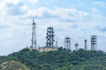telecommunication tower with telecom broadcasting antenna on mountain