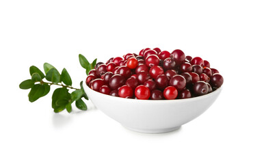 Bowl of ripe cranberries on white background