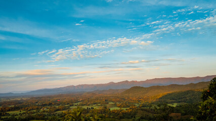 Beautiful landscape mountain green field grass meadow white cloud blue sky on sunny day. Majestic green scenery big mountain hill cloudscape valley panorama view in countryside greenery pasture