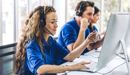Group of happy call center smiling business operator customer support team phone services agen...