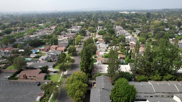 Pasadena aerial view above urban residential district neighbourhood real estate streets moving forward