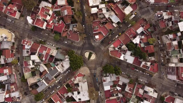 Aerial top down rising over Parque Chas intersection in urban area of Buenos Aires. Argentine