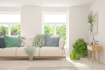 White living room with sofa and summer landscape in window. Scandinavian interior design. 3D illustration