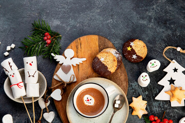 Christmas composition with hot chocolate and cookies.