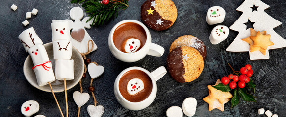 Christmas composition with hot chocolate and cookies.