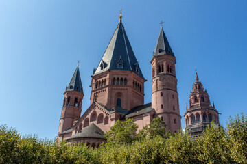 Low angle view of the towers of the medieval St. Martin’s Cathedral in Mainz, Germany. Built around the year 1000.