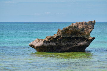 Boracay, Philippines - Jan 25, 2020: famous landmark of Boracay island. A small rock in the sea.