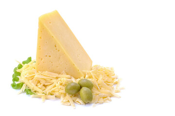 A piece of hard yellow cheese with olives in close-up, isolated on a white background