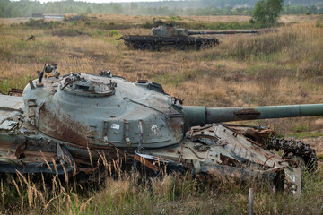 Old, destroyed tanks used as targets