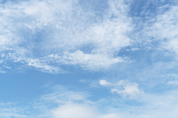 Beautiful clouds during spring time in a Sunny day. Blue sky and white fluffy clouds