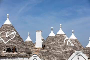 Stone roof of Trulli House in Alberobello, Italy. The style of construction is specific to the...