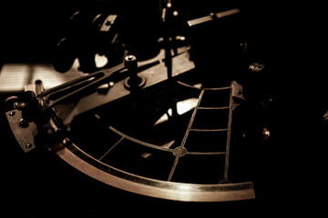 Sextant isolated on black background. Sextant is an ship manual navigation tool use in...