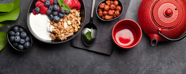 Healthy breakfast with granola, yogurt and berries