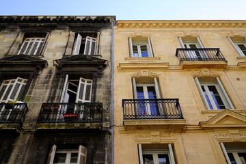 Before and After cleaning building stones city facades with difference of wash clean house and dirty one in town