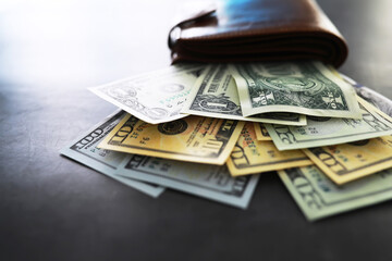 Group of money stack of 100 US dollars banknotes a lot of the background texture. Cash money in a large pile as a finance background.