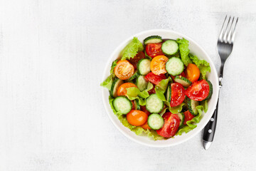 Fresh salad with tomato and cucumber