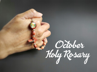 Christianity Concept - October holy Rosary text background. Stock photo.