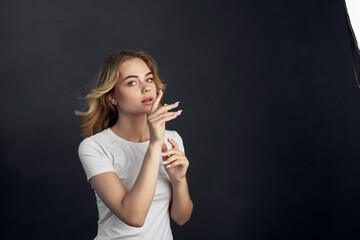 Fototapeta premium beautiful woman attractive look makeup posing dark background