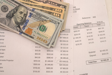 the business charts of the projects include a calculator, dollar bills and a pen