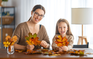family doing autumn decor
