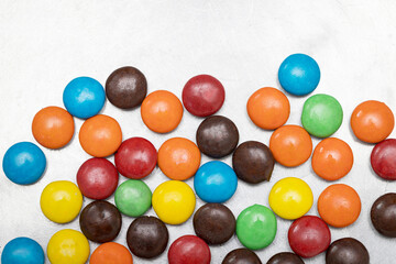 Variety of colorful candies coated