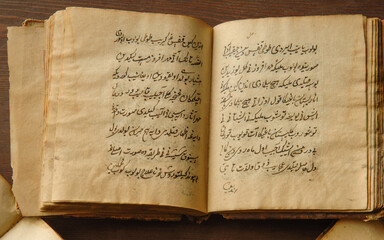 Ancient open book in arabic. Old arabic manuscripts and texts