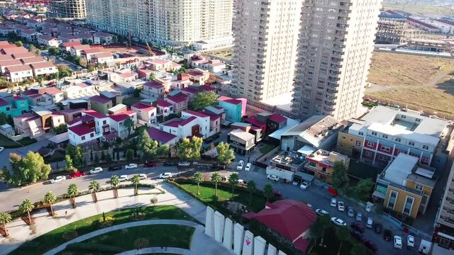 Aerial shot of Erbil showing Sakura park - MRF Tower - iraq  4k