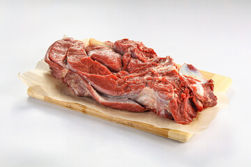Raw beef meat over board