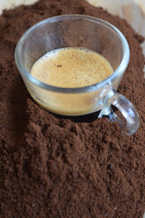 espresso dipped in ground coffee