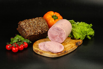 Pork ham sausage cut isolated