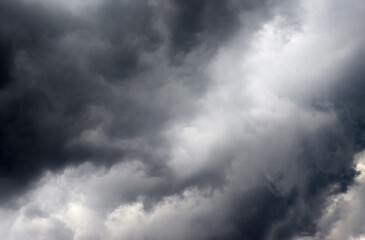 Naklejka na ściany i meble Storm clouds in sky. Weather backdrop. Dark autumn background