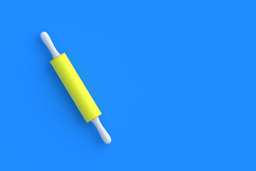 Modern rolling pin on blue background. Culinary equipment. Kitchen accessory. Copy space. Top view. 3d render