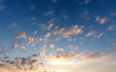 Naklejka na ściany i meble Clouds at the sunset time 