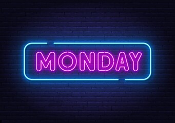 Monday neon sign on brick wall background.