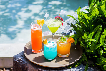Mixed fruit juices to welcome tourists in a relaxing vacation concept resort.