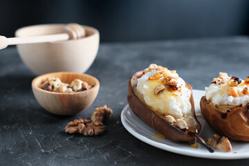 fall season comfort food. baked pears and ricotta with nuts and honey. warm dessert for autumn...