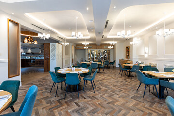 Interior of an empty modern hotel restaurant