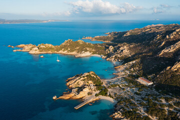 Fototapeta na wymiar View from above, aerial shot, stunning panoramic view of Spargi Island with Cala Corsara, a white sand beach bathed by a turquoise water. La Maddalena archipelago National Park, Sardinia, Italy.
