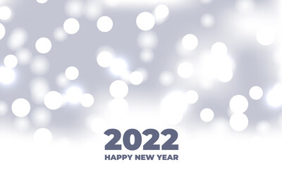 Fototapeta na wymiar Happy new 2022 year white bokeh background festive defocused lights effect. Holiday glowing white lights with sparkles. Vector illustration