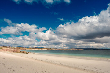 View on Gurteen bay, county Galway, Ireland. Warm sandy beach with clear blue sky and water. Popular travel and holiday destination. Irish landscape. Nobody