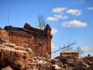 an old dilapidated building, a summer day