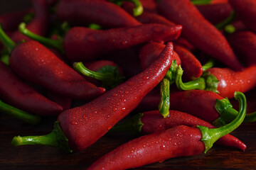 Closeup fresh wet red chili peppers