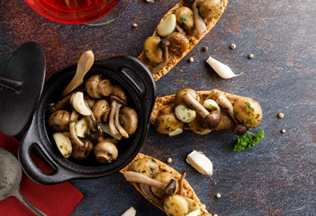 Mushrooms in garlic butter sauce. Mushrooms prepared with garlic , fresh butter and parsley served as a appetizer.