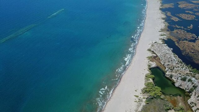 Spawning place of loggerhead turtles; Iztuzu beach. It is known for its blue crab and golden sands. Next to the Dalyan delta. Aerial drone movie.