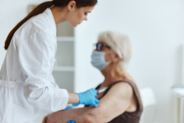 elderly woman vaccine passport immunity protection