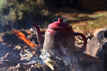 Cafetera en leña y fuego