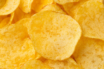 Potato Chips with cheese and onion. background, texture. Macro photo