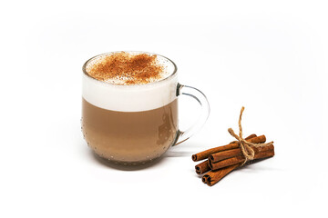 Latte coffee with cinnamon. Glass cup of cappuccino isolated on white.